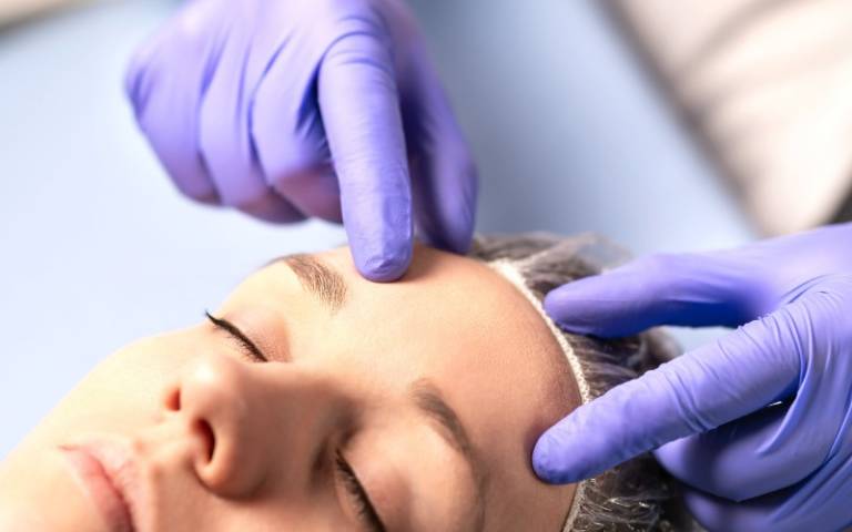 cosmetologist-plastic-surgeon-or-doctor-with-patient-or-customer-consultation-and-plan-before